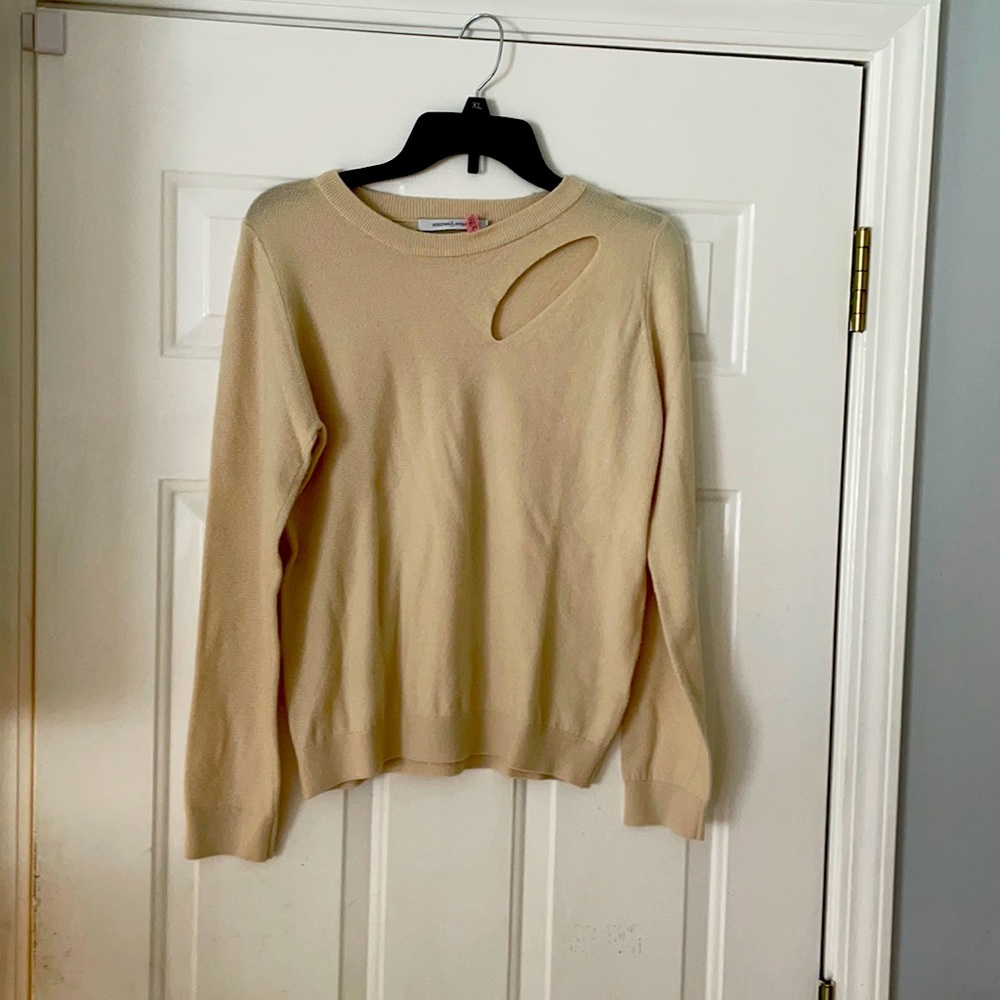 Cream sweater with oval circle